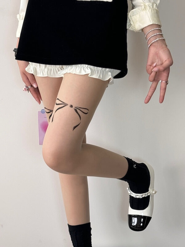 cutiekill-dollette-bow-tattoo-tights-c0395