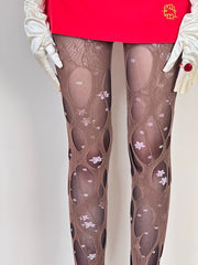 cutiekill-edgy-y2k-ripped-tights-c0450