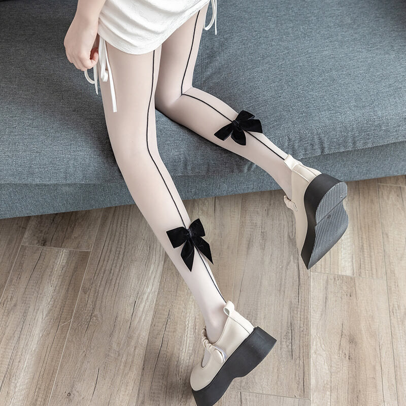 cutiekill-black-flocking-bow-random-cutting-tights-c0045