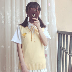 JK yellow chick sweater vest