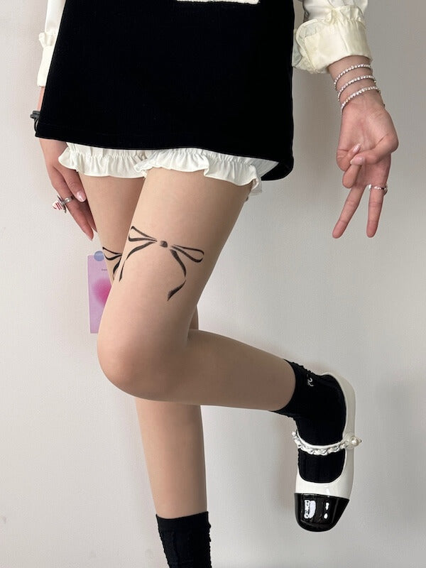 cutiekill-dollette-bow-tattoo-tights-c0395 