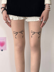 cutiekill-dollette-bow-tattoo-tights-c0395 