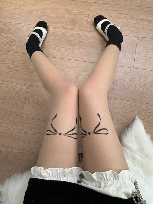 cutiekill-dollette-bow-tattoo-tights-c0395  600